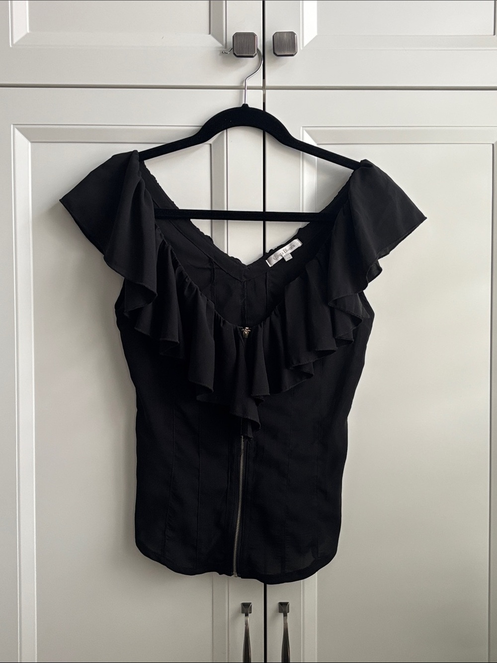 Costa Blanca Black Ruffle V-Neck Blouse with Front Zip Detail